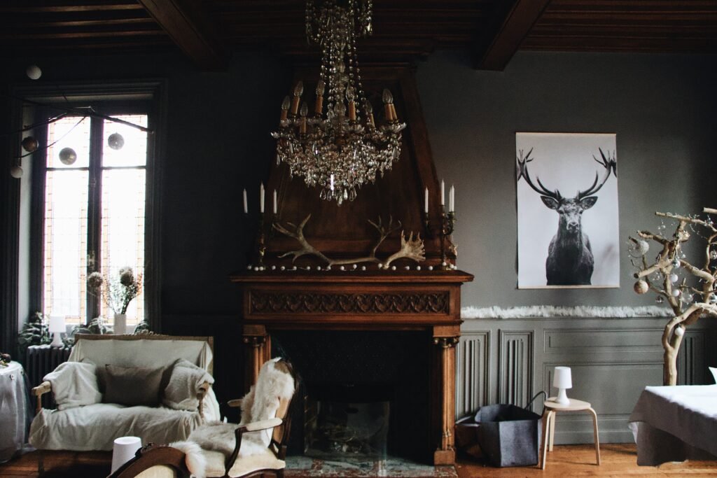 A living room displays a moody paint palette in grey.