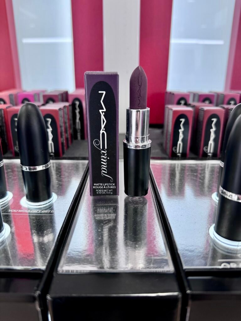 A display of a deep purple lipstick by MAC Cosmetics.