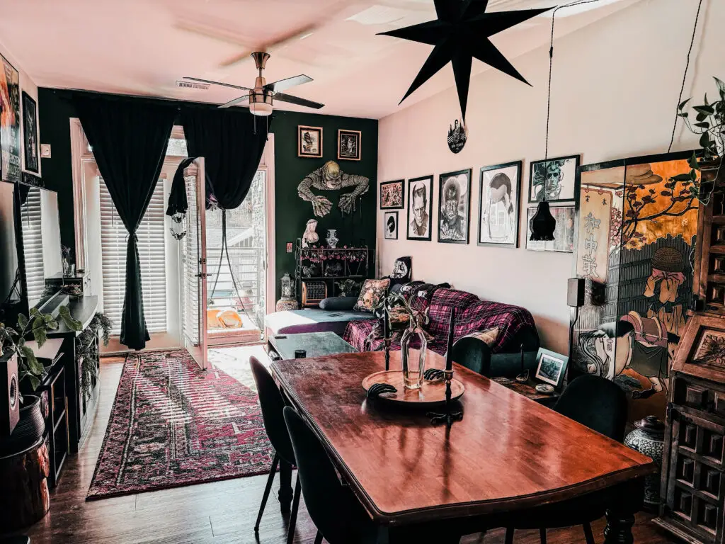 Natural light pouring into a living room with goth decor.